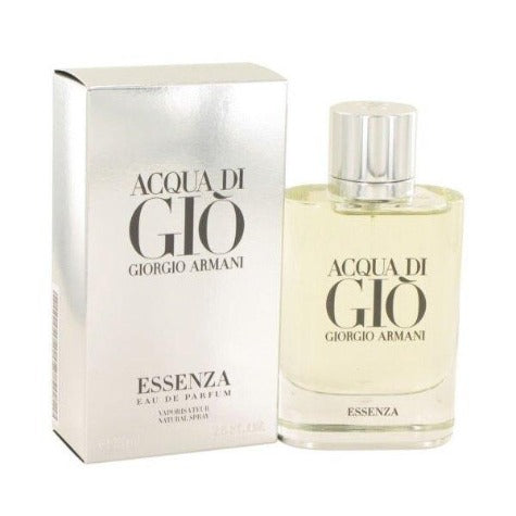 Acqua Di Gio Essenza fragrance bottle next to white box packaging with clear cap and pale yellow liquid.