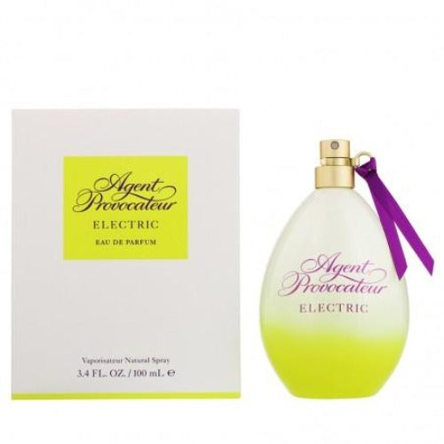 Agent Provocateur Electric fragrance bottle with yellow gradient and purple ribbon next to white box