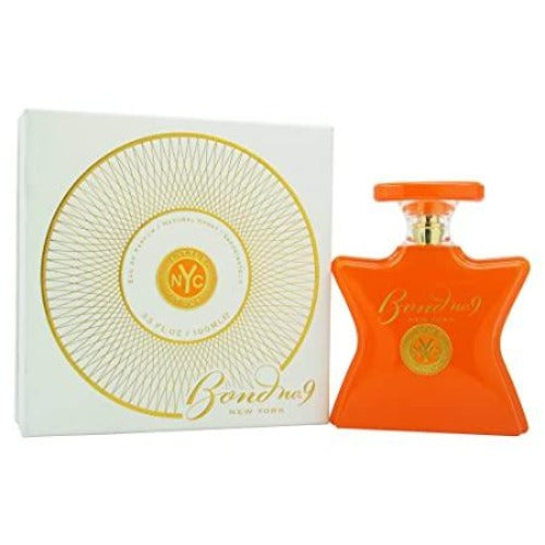 Bond No. 9 Little Italy orange eau de parfum bottle with gold accents next to white box