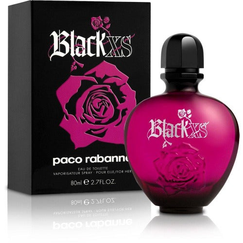 Black Xs by Paco Rabanne eau de toilette bottle with magenta rose design next to black box packaging