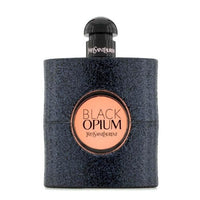 Black Opium Eau De Parfum bottle with dark textured exterior and copper-colored label medallion