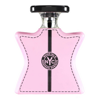 Bond No. 9 Madison Avenue perfume bottle in pink with black cap and striped detail band