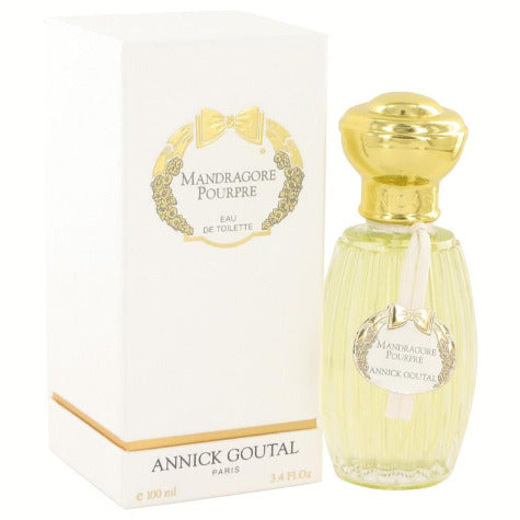 Annick Goutal Mandragore Pourpre fragrance bottle with white box packaging, gold accents and ribbon design.