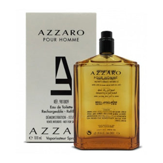 Azzaro Pour Homme fragrance bottle with box, amber liquid in clear glass container with black cap.