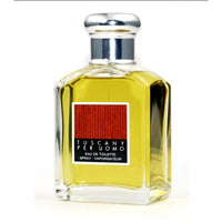 Tuscany Per Uomo Eau de Toilette 3.4 oz transparent bottle with yellow juice front view