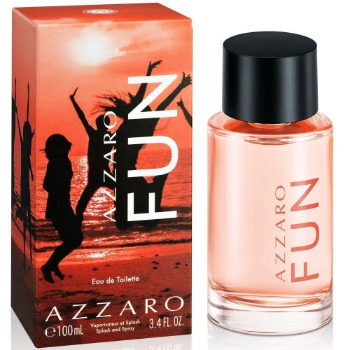 Azzaro Fun bottle with coral box featuring silhouette of person jumping at sunset