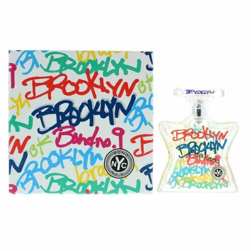 Bond No. 9 Brooklyn perfume bottle next to colorful graffiti-style box packaging in white, red, blue, and yellow.