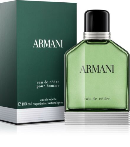 Armani Eau De Cedre bottle with green liquid next to teal box packaging