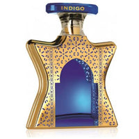 Bond No. 9 Dubai Indigo eau de parfum bottle with gold geometric patterned design and blue cap