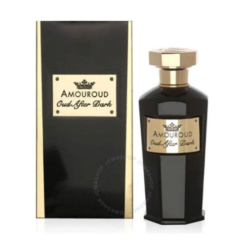 Amouroud Oud After Dark perfume bottle with black glass and gold hexagonal cap next to matching black and cream box packaging