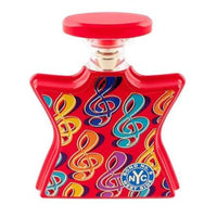 Red Bond No. 9 West Side perfume bottle with colorful musical note pattern and red cap.