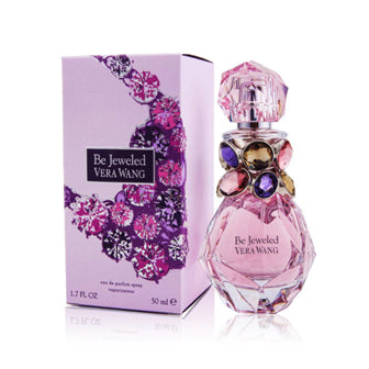 Be Jeweled Eau De Parfum bottle in pink with matching box and decorative stopper